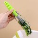 Multi Functional cutter With Storage Tube Peeler - green Multi Functional cutter With Storage Tube Peeler - green